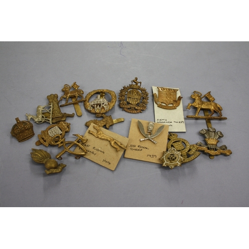 233 - Tin of Military cap badges