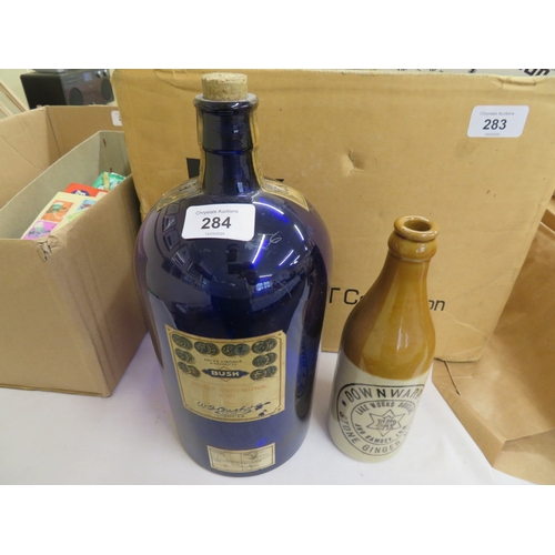 284 - Large Bristol blue medicine bottle plus a Downards ginger ale bottle