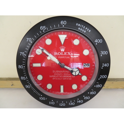 36 - Wall clock in the form of a red dial Rolex Submariner
