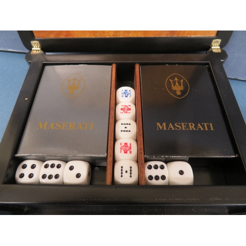 39 - Maserati logo playing card and die set - housed in an walnut and ebonized box - good condition