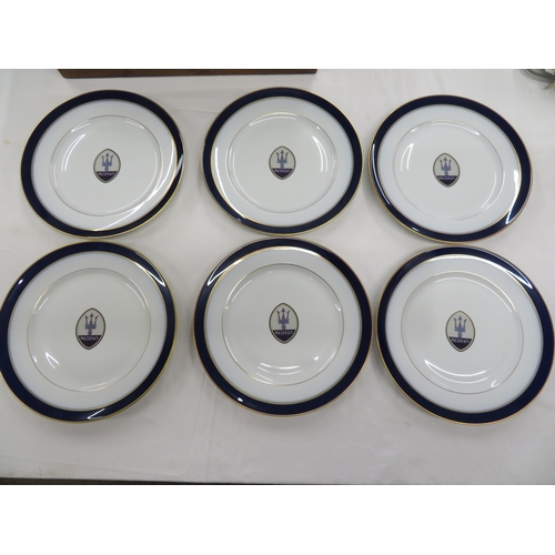 41 - Set of Six Bernardaud Limoges Maserati dishes - with gilt and navy blue borders - bearing the Masera... 