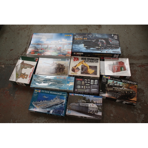Ten boxed model kits including tanks, Aircraft carriers, excavator etc ...