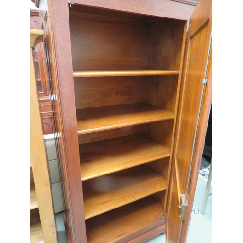 124 - Oak storage cupboard with four shelves