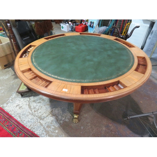 36 - Good quality circular mahogany games table with tooled leather insert to top brushing slide drinks h... 