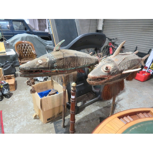 38 - Two Balinese decorative freestanding fish ornaments on heavy metal bases Length approx 57