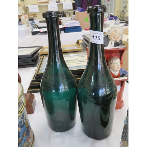 217 - Pair of Emerald glass wine bottles