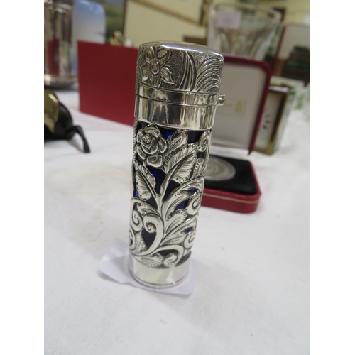 246 - Chased pierced silver scent bottle