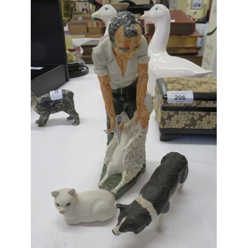 208 - Three Shebeg figures - Sheep shearer, sheep dog and white Manx cat