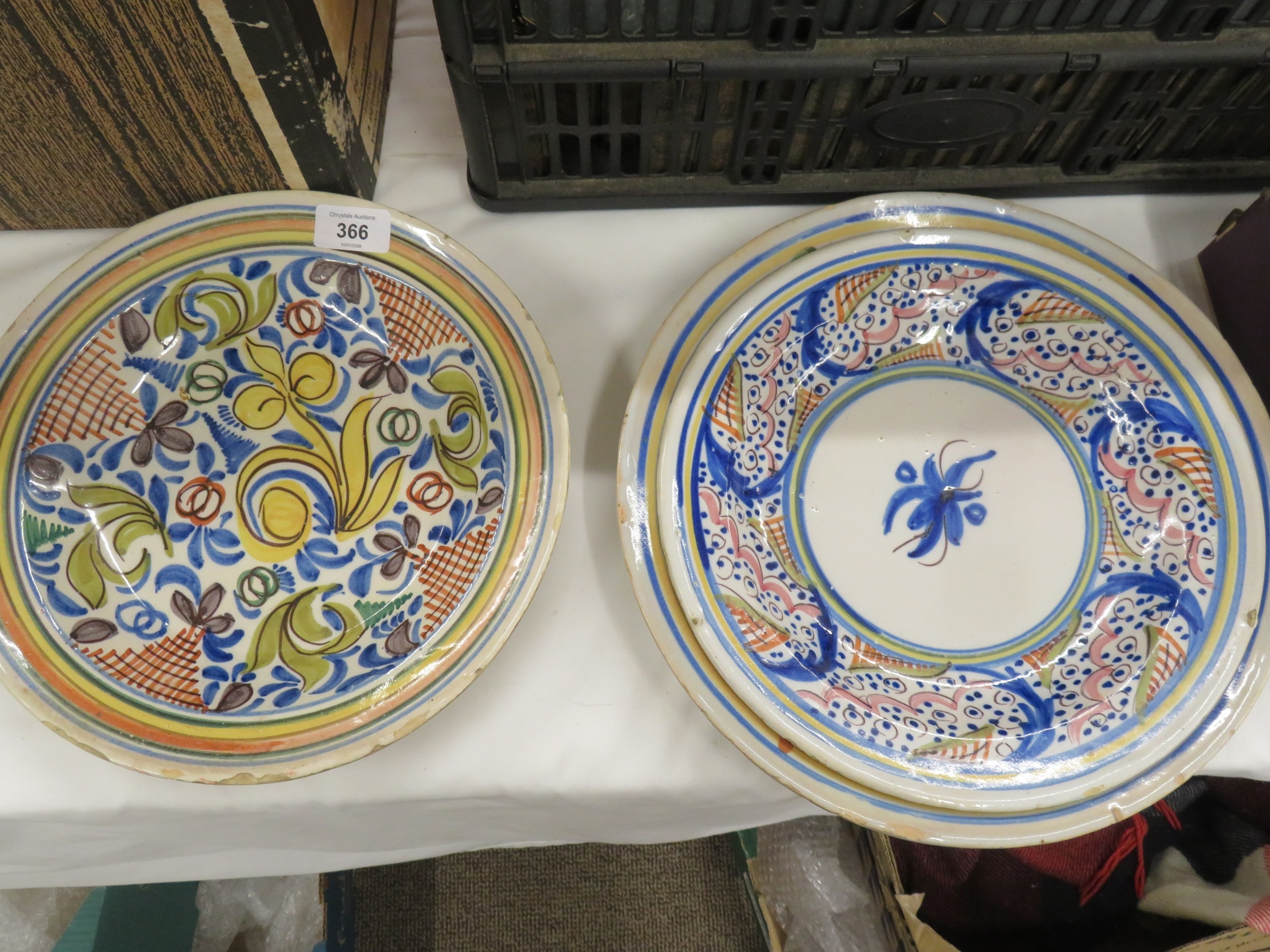 Three coloured delftware dishes
