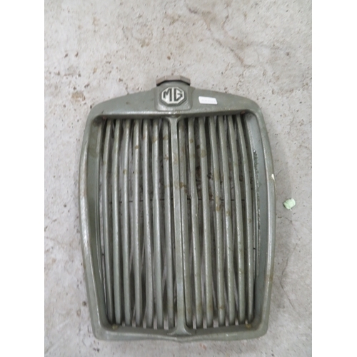 MG radiator grill, Car horn and an old spare tyre