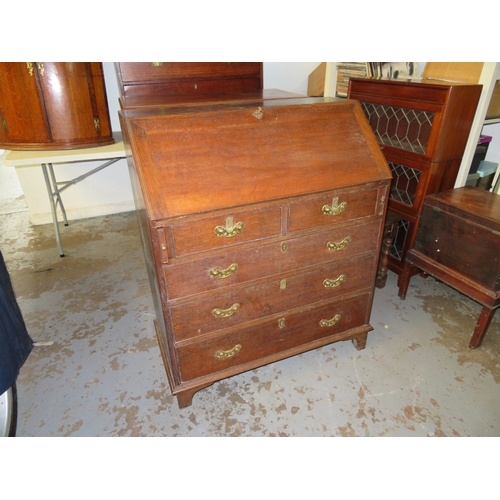 245 - Oak fall front bureau with two short and three long drawers