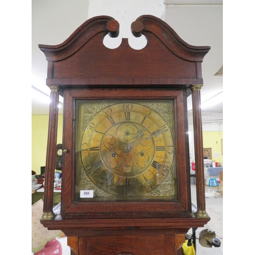 260 - Oak eight-day long case clock with brass dial, ormolu spandrels, date apeture by Jonathan Owen - Lla... 