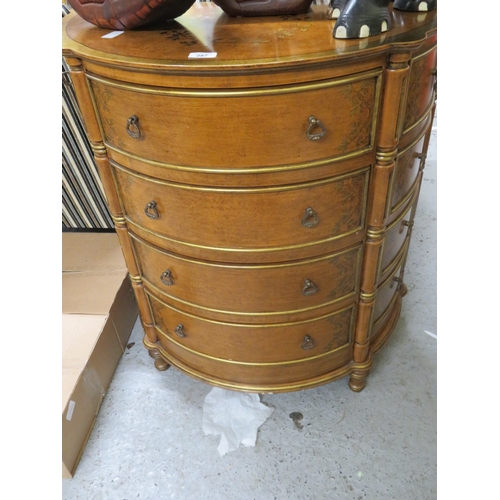 287 - Bow front chest of four drawers (Back leg broken)