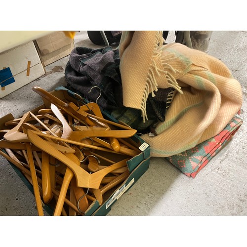 271 - Pile of blankets, plus a box of wooden clothes hangers