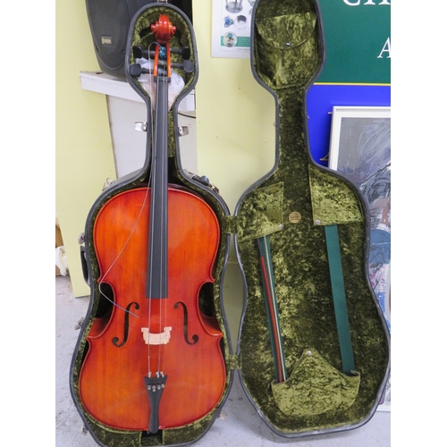 194 - Student's cello in armadillo case, together with bow