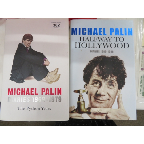 302 - Two Michael Palin hardback books with dust covers, both signed