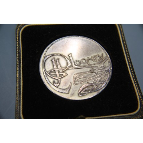 230 - J P Looney, Memorial of his Works as Conductor of Choirs - Manx Music Festival, silver medallion, ca... 