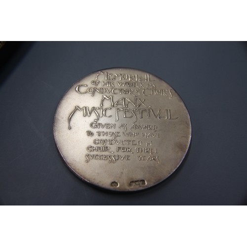 230 - J P Looney, Memorial of his Works as Conductor of Choirs - Manx Music Festival, silver medallion, ca... 