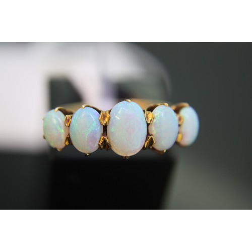 315 - 14ct gold oval five stone opal ring, size L