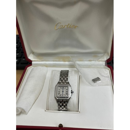 347 - Cartier ladies stainless steel tank wristwatch with cabochon sapphire to crown, number 607963UF, com... 