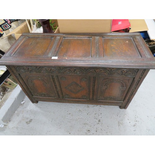 351 - Carved oak paneled blanket box