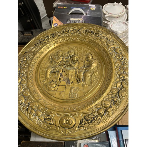 181 - Box of metalware, including a clock, plus metal fire plate