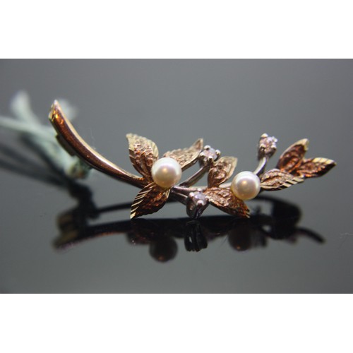 9 ct. gold diamond and pearl brooch in the form of a branch - wt. 2.4 grms