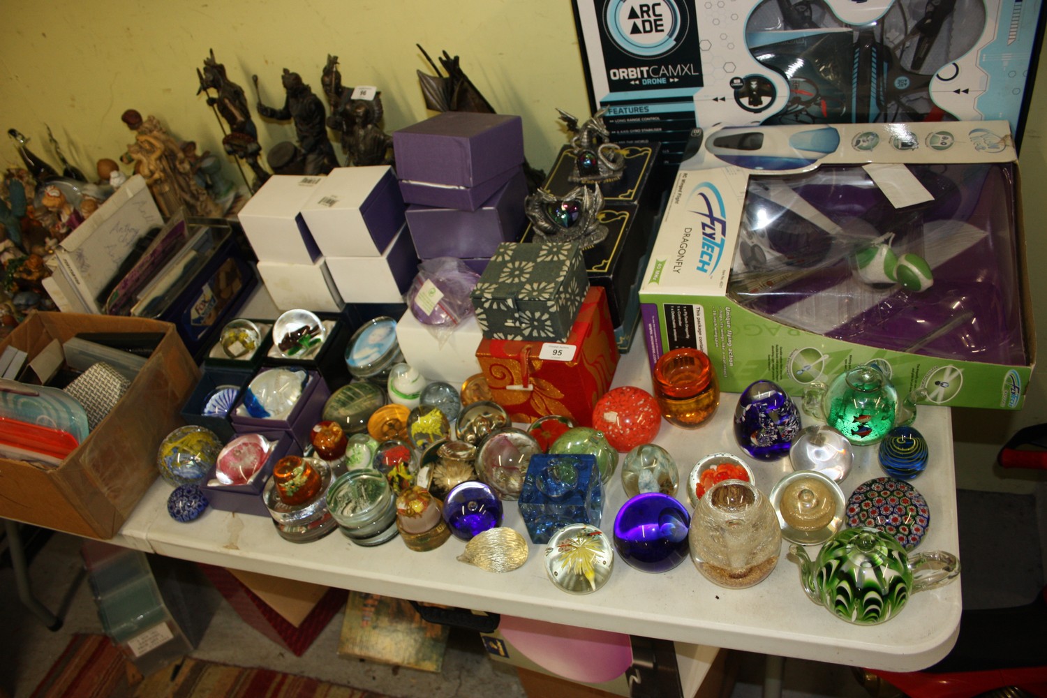 Good collection of glass paperweights plus two dragon ornaments