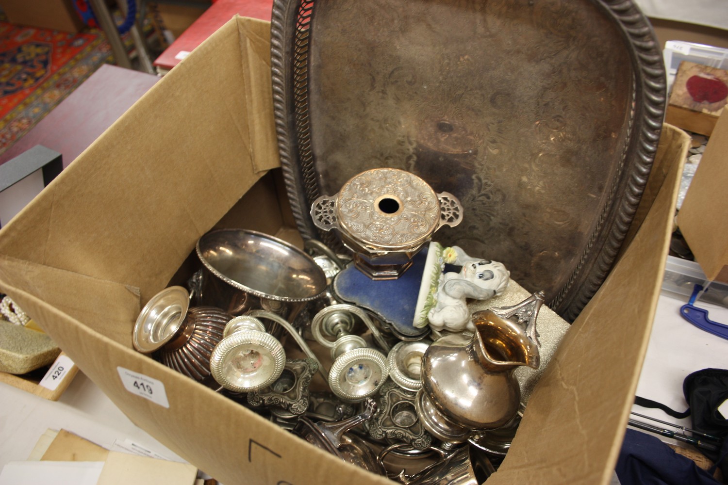 A box of silverplated ware