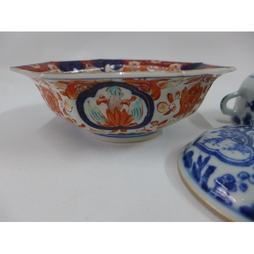 113 - A Chinese octagonal Imari bowl, 20cm wide together with a blue and white bowl and cover, 17cm (2)