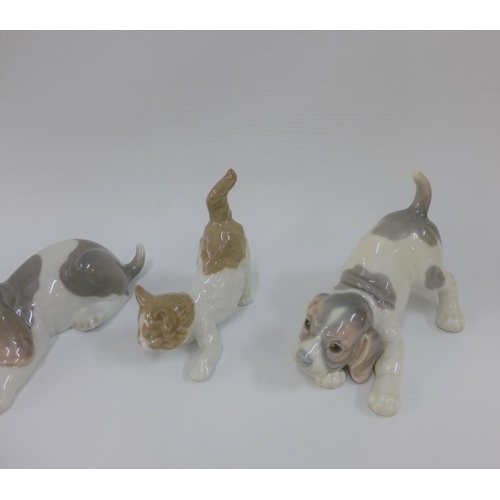 116 - Collection of two Lladro dogs, Lladro cat and a Nao dog figure tallest 15cm (4)