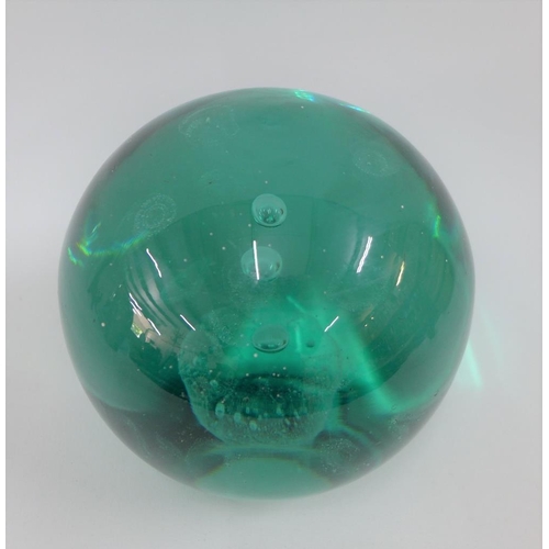 119 - Large green glass paperweight dump, 14cm high