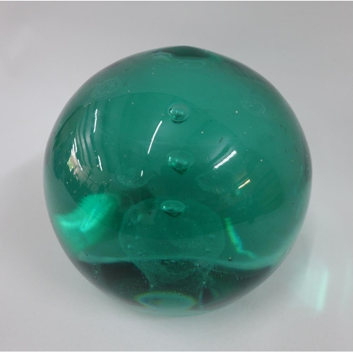 119 - Large green glass paperweight dump, 14cm high