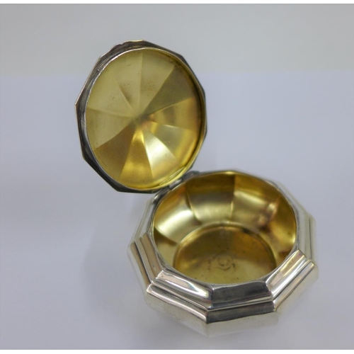 28 - Continental silver gilt decagon shaped snuff box, with hinged lid, unmarked,  8cm