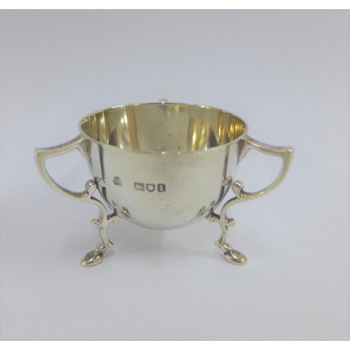 45 - Edwardian miniature silver bowl, with three loop handles and hoof feet, London 1906, 5cm high