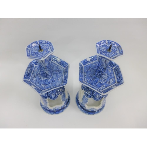 66 - Pair of Chinese blue and white candlesticks, 23cm high