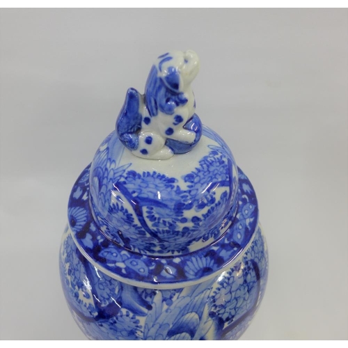 68 - Chinese blue and white covered vase, the lid with temple lion finial, 34cm high