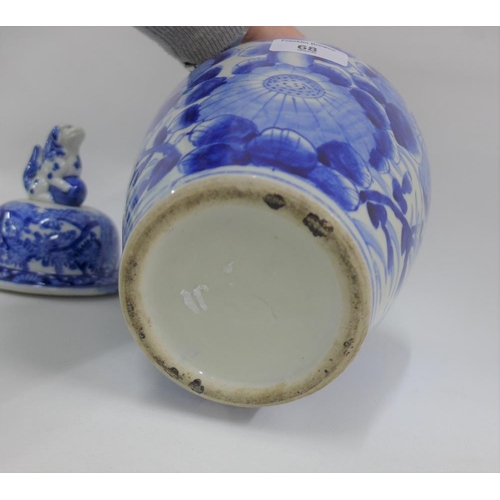 68 - Chinese blue and white covered vase, the lid with temple lion finial, 34cm high