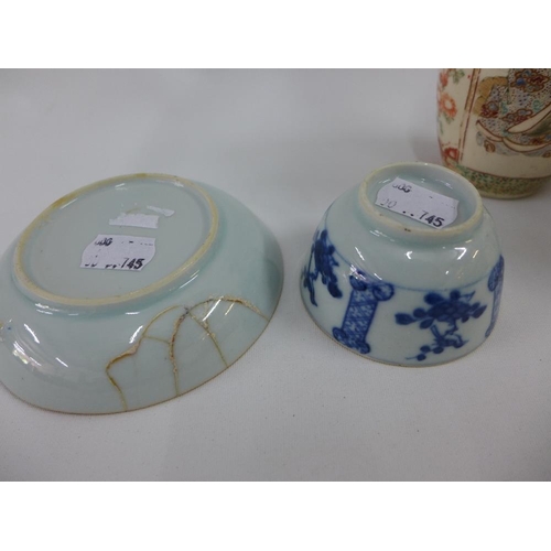 69 - Pair of Japanese earthenware Satsuma vases, 15cm high, and a pair of Chinese blue and white tea bowl... 