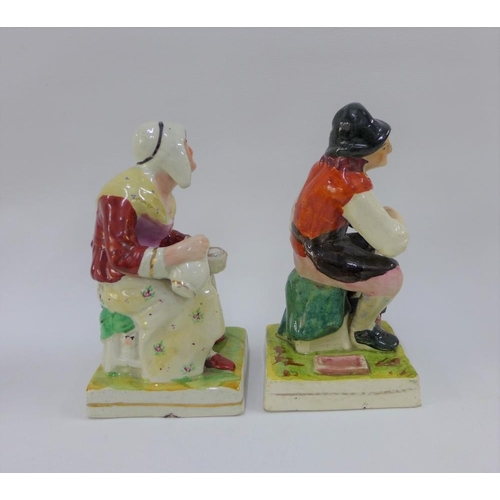 81 - A pair of Staffordshire figures cobbler Jobson and his wife Nell, on square gilt lined bases, 17cm h... 