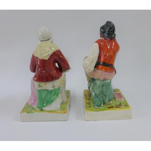 81 - A pair of Staffordshire figures cobbler Jobson and his wife Nell, on square gilt lined bases, 17cm h... 