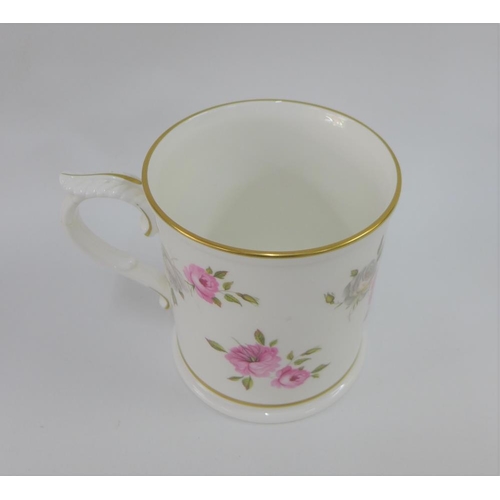 86 - Royal Worcester fine bone china tankard with floral sprays and gilt rims, printed backstamp, 12.5cm ... 