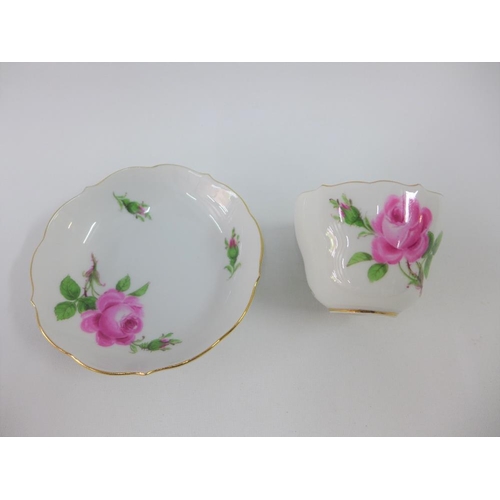 95 - Meissen rose patterned cabinet cup and saucer, with blue crossed swords mark (2)