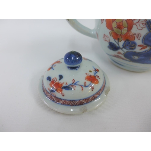 107 - Chinese Imari porcelain teapot and cover, typically painted with flowers and foliage, 14cm high (a/f... 
