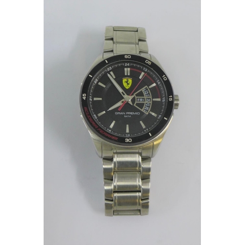 61 - Gent's Scuderia Ferrari wristwatch, with black enamel dial inscribed Gran Premio 5ATM, on a stainles... 
