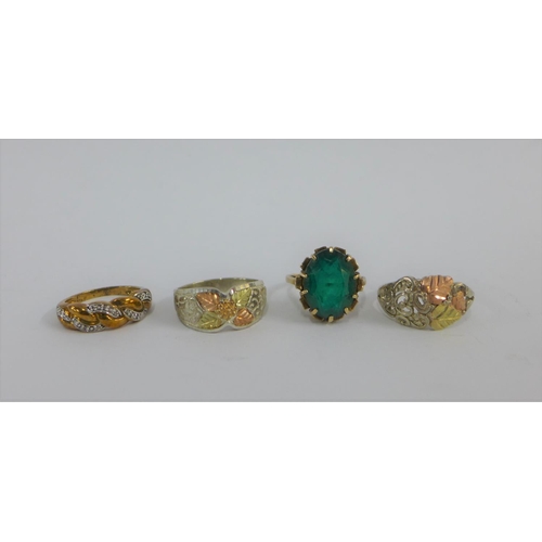 62 - 9 carat gold dress ring together with an unmarked 9 carat gold ring with green claw set stone and tw... 