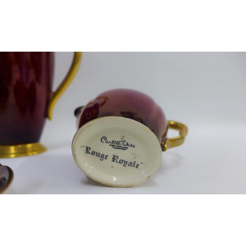 76 - Carlton Ware rouge Royale coffee set comprising coffee pot, cream jug, twin handled sugar bowl, six ... 