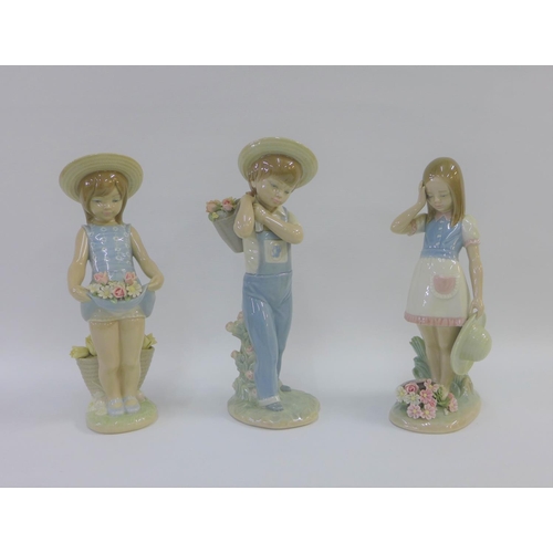 79 - Collection of three Lladro girl and boy figures, all with printed backstamps, tallest 25cm (3)
