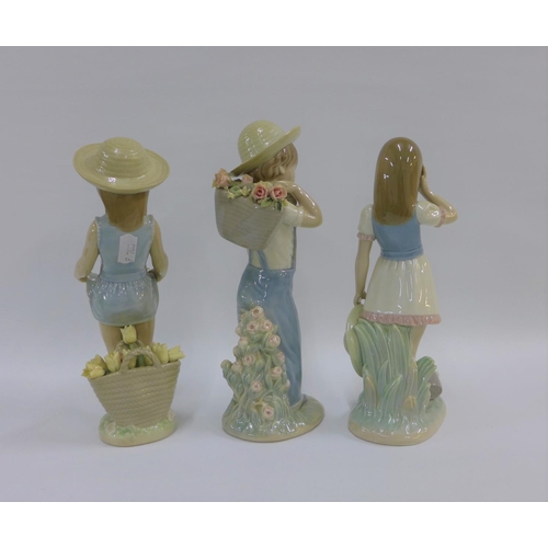 79 - Collection of three Lladro girl and boy figures, all with printed backstamps, tallest 25cm (3)