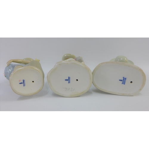 79 - Collection of three Lladro girl and boy figures, all with printed backstamps, tallest 25cm (3)